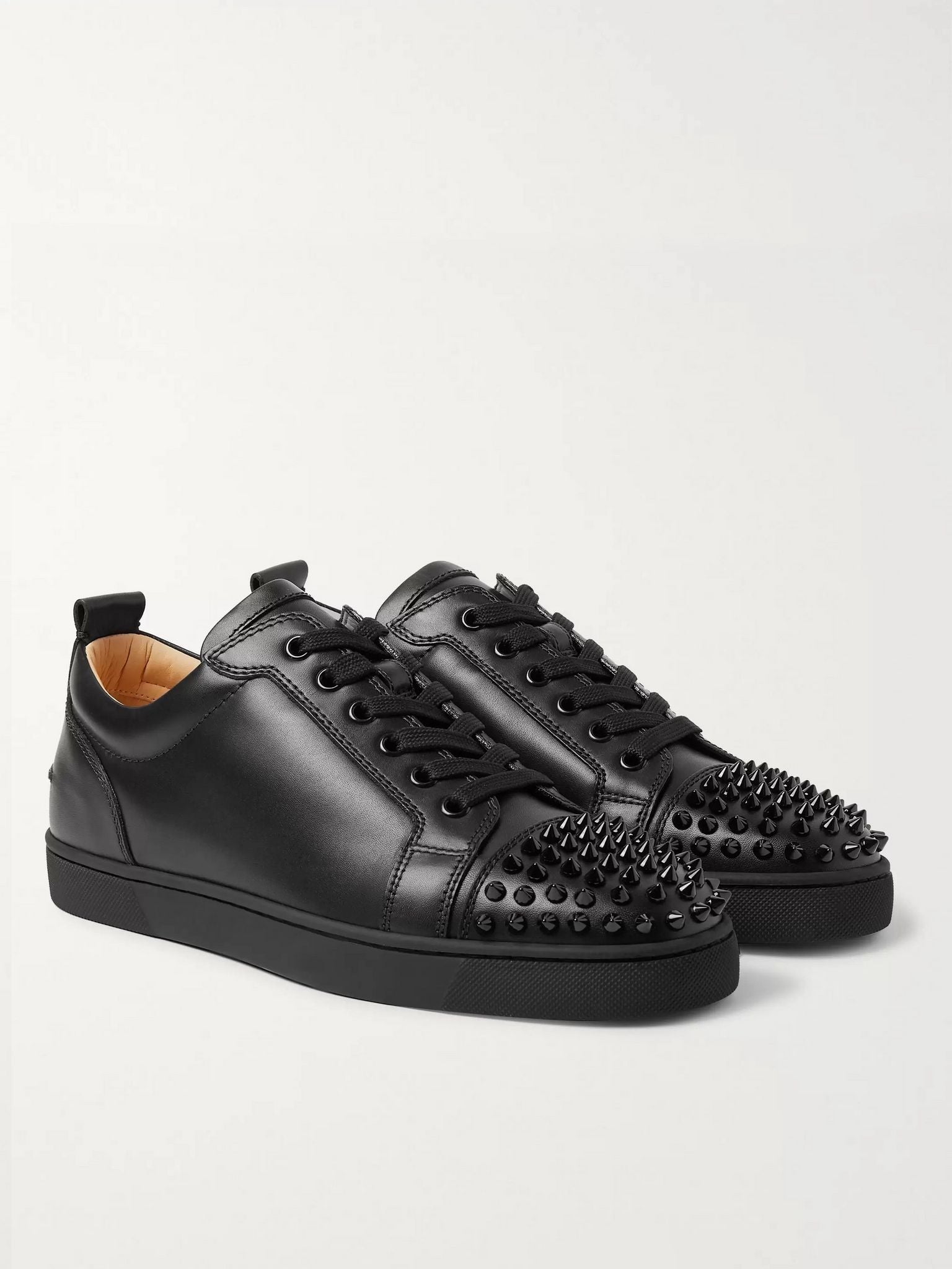 CHRISTIAN LOUBOUTIN
Louis Junior Spikes Cap-Toe Suede Sneakers