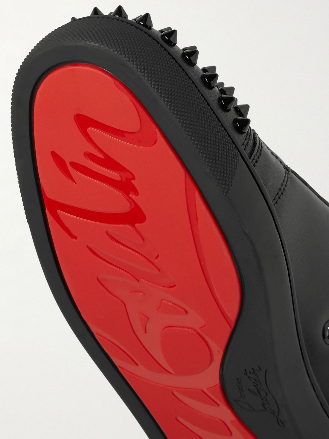 CHRISTIAN LOUBOUTIN
Louis Junior Spikes Cap-Toe Suede Sneakers