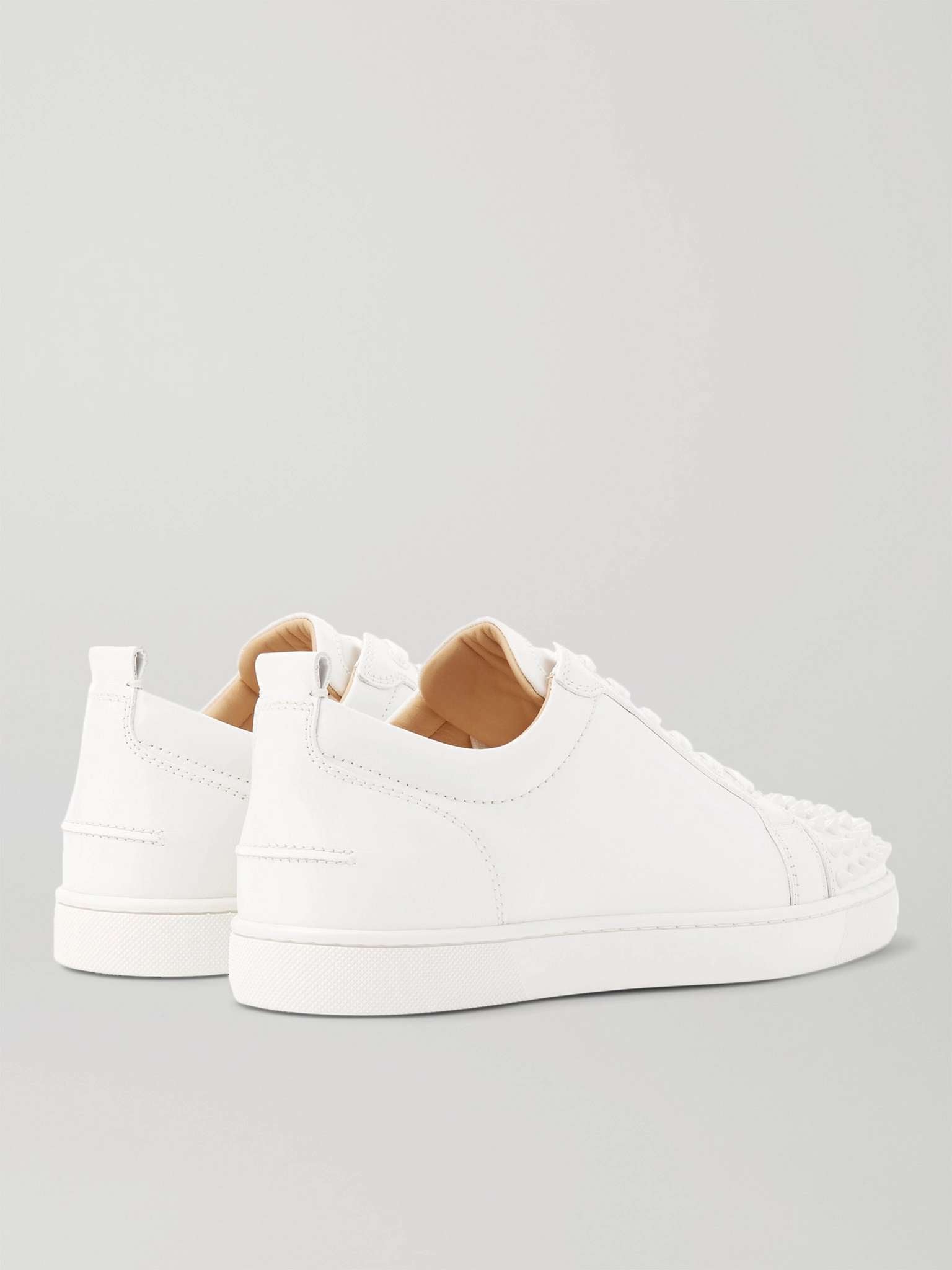 CHRISTIAN LOUBOUTIN
Louis Junior Spikes Cap-Toe Suede Sneakers