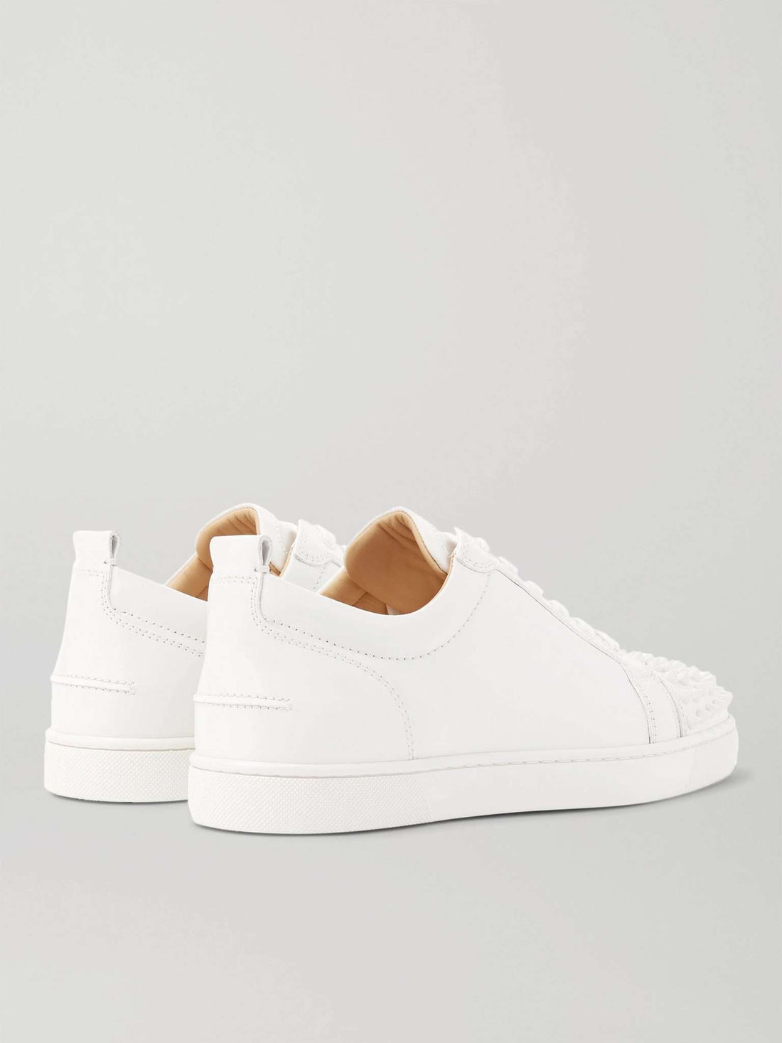 CHRISTIAN LOUBOUTIN
Louis Junior Spikes Cap-Toe Suede Sneakers