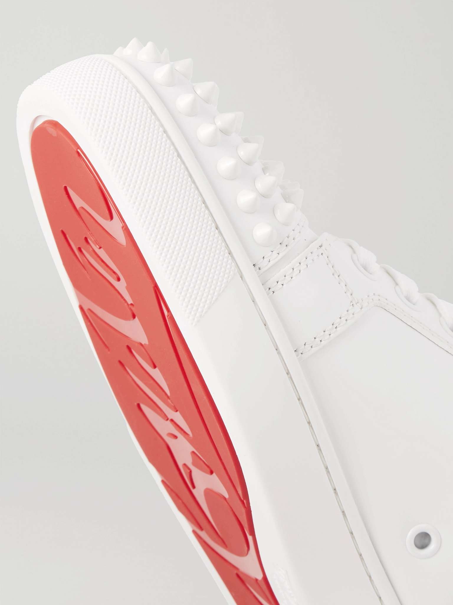 CHRISTIAN LOUBOUTIN
Louis Junior Spikes Cap-Toe Suede Sneakers