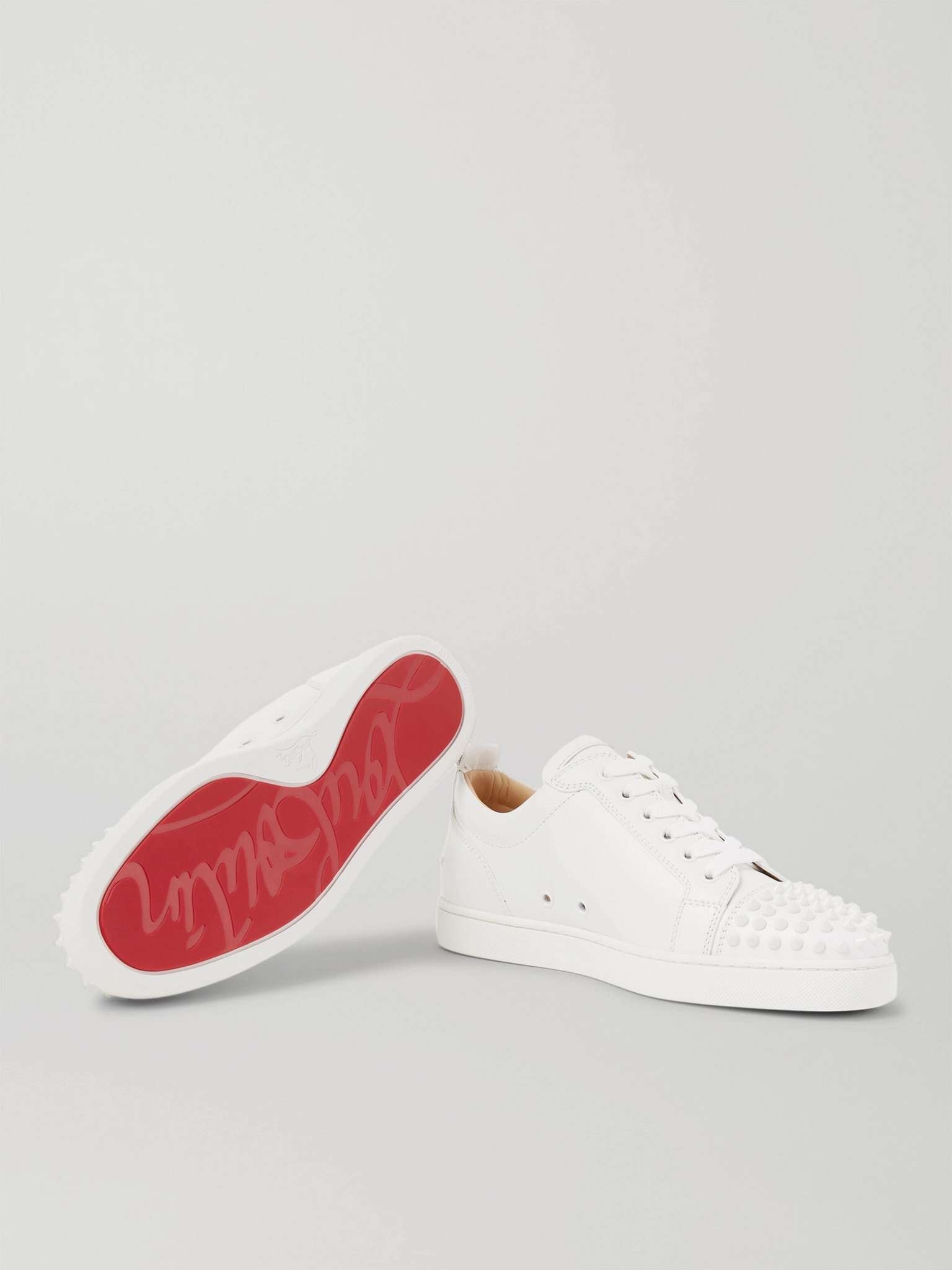 CHRISTIAN LOUBOUTIN
Louis Junior Spikes Cap-Toe Suede Sneakers
