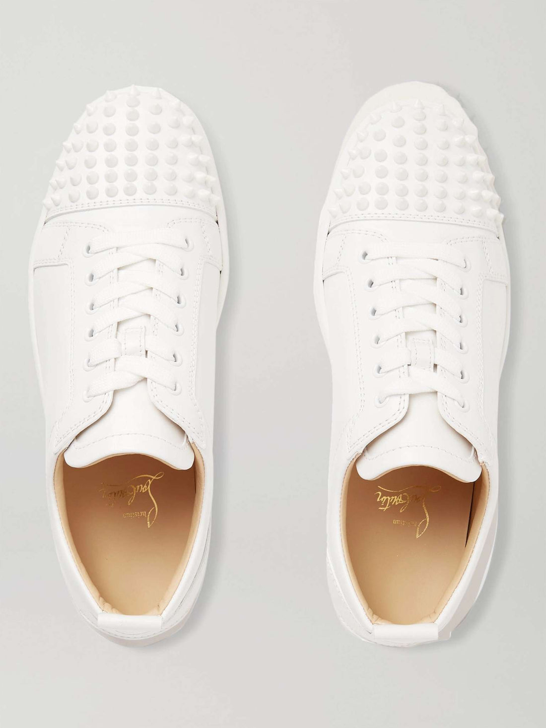 CHRISTIAN LOUBOUTIN
Louis Junior Spikes Cap-Toe Suede Sneakers